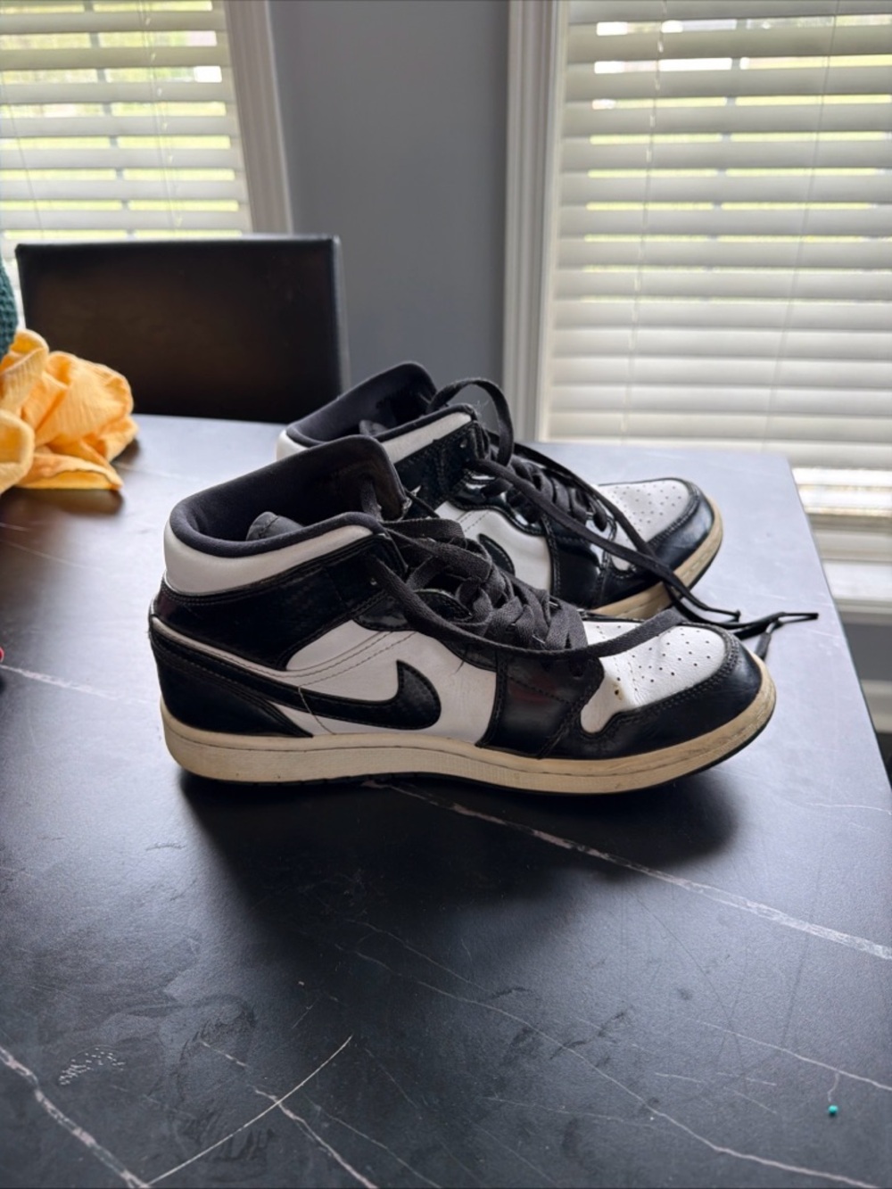Jordan Black and White Mid-Top Sneakers